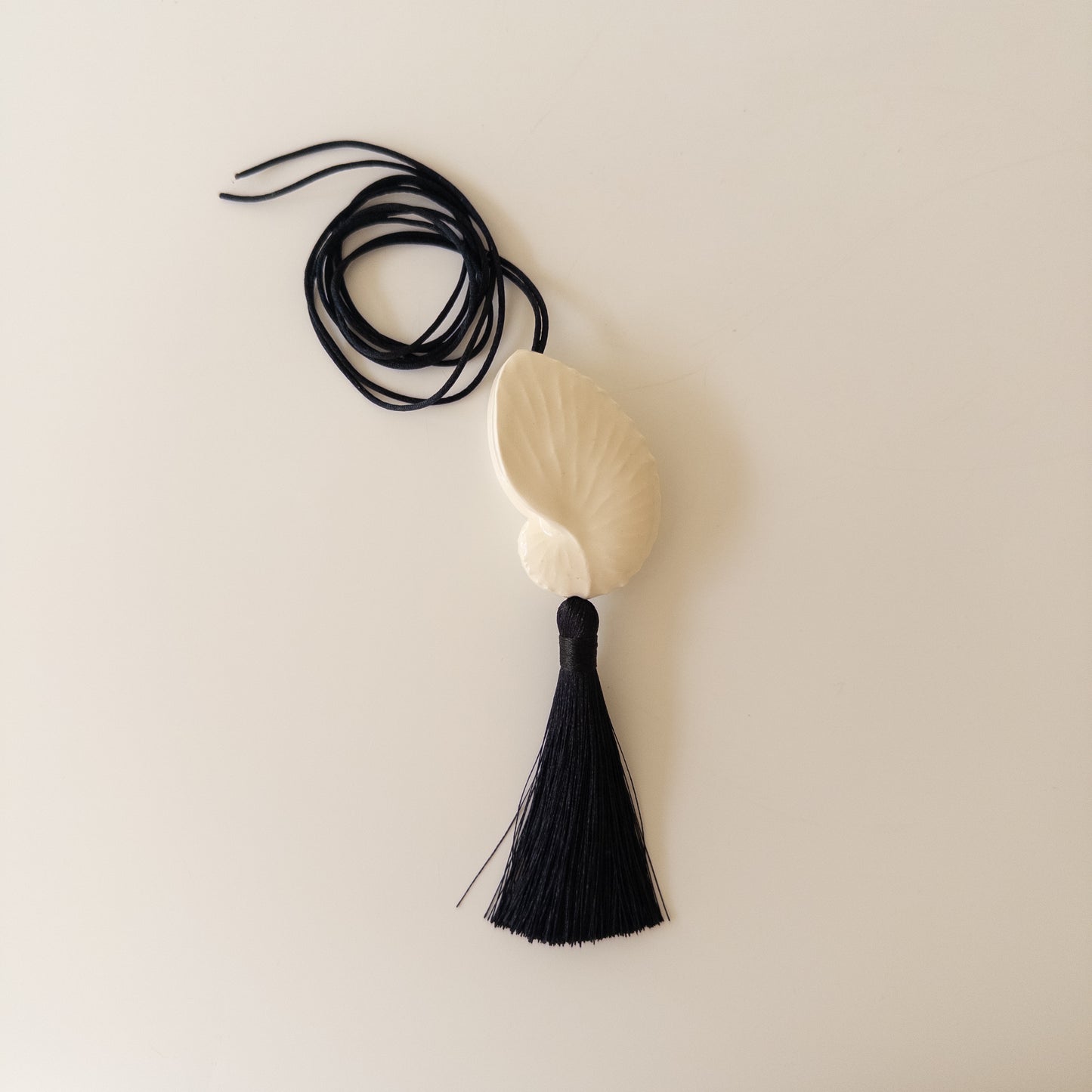 Мушля Октопус з китицею