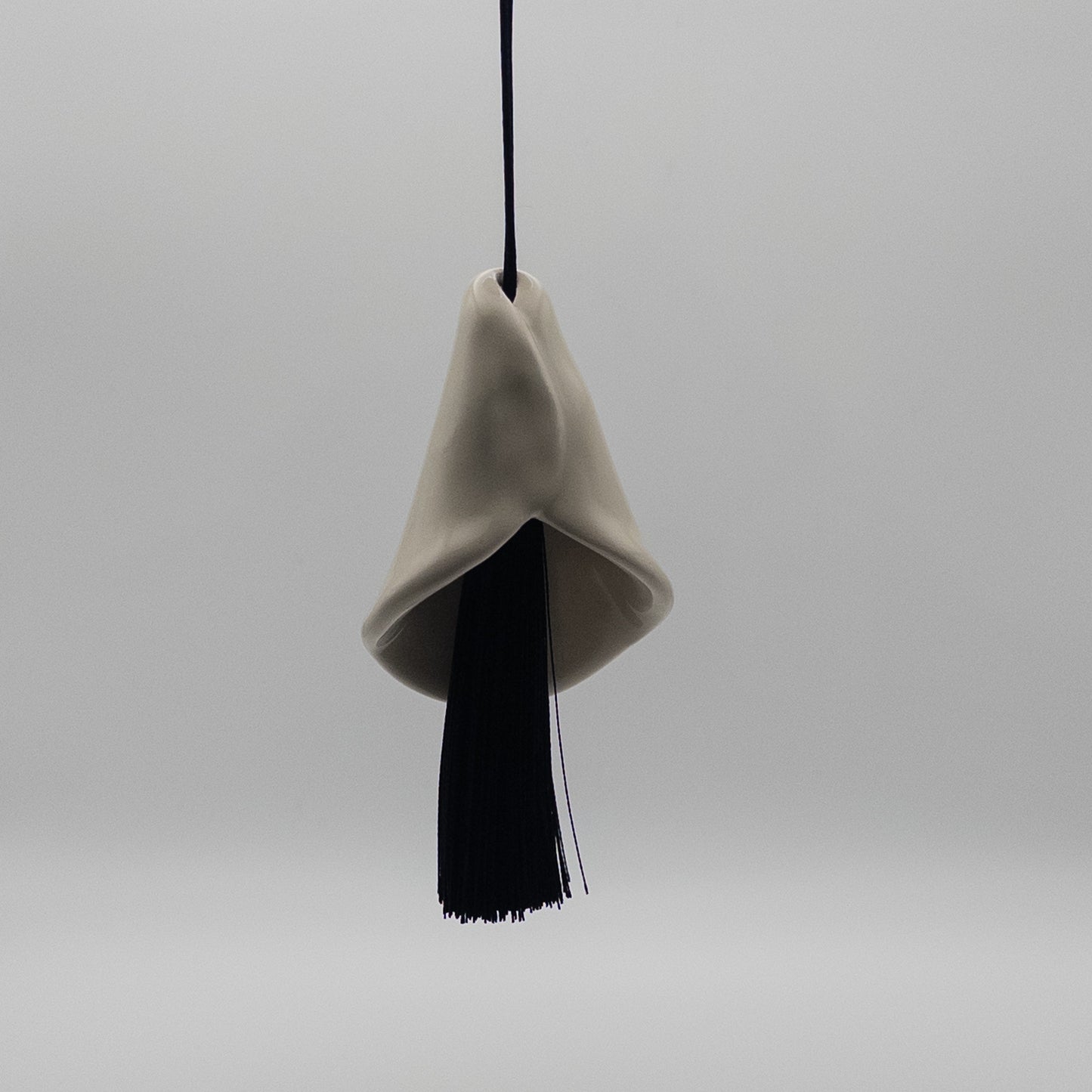 Кала з китицею