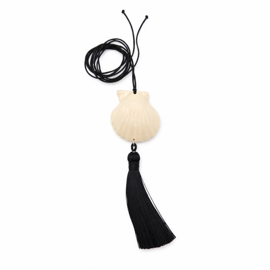 Мушля Гребінець з китицею