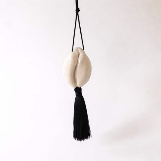 Cowrie with tassel