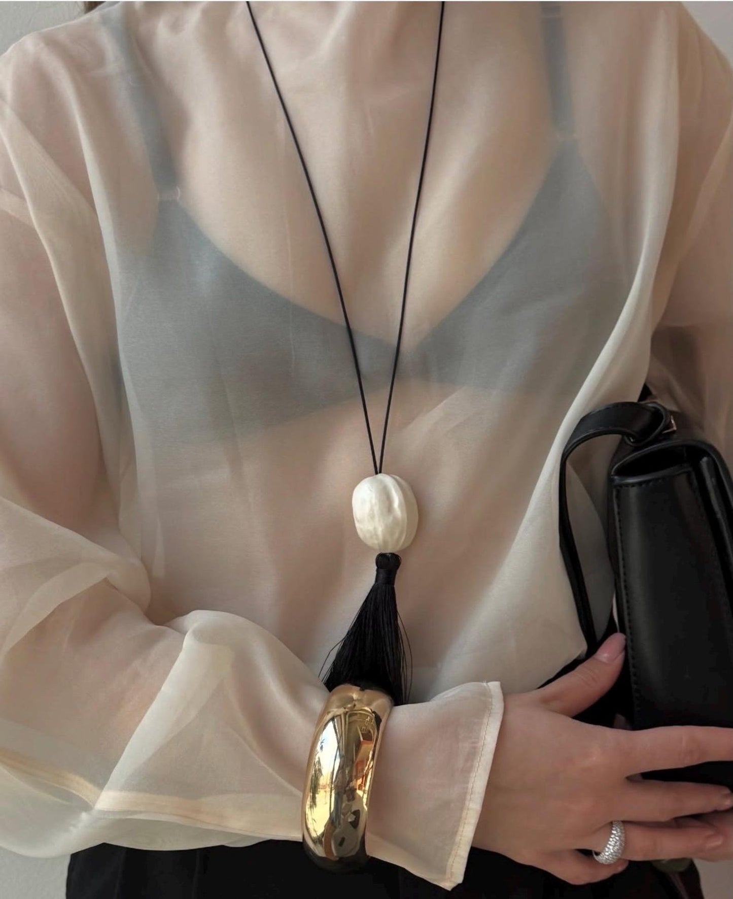 Nut with tassel